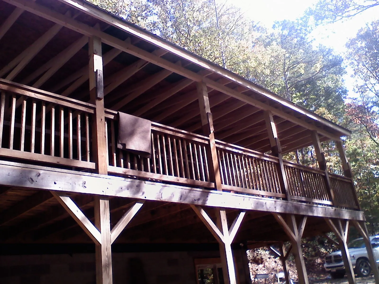 Timber framing under a new elevated porch and deck — Roof Leak Repair in Owatonna by Roofing Brothers
